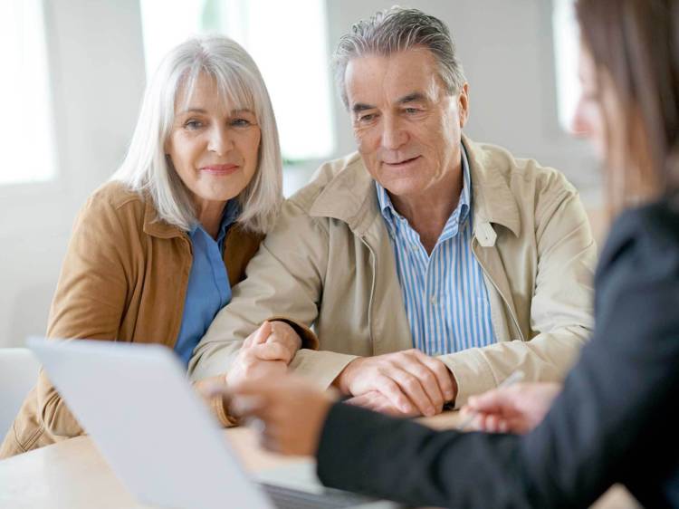 Elderly couple getting investment advice