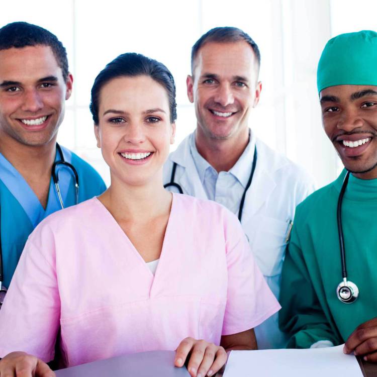 Group of diverse medical professionals in various fields standing together